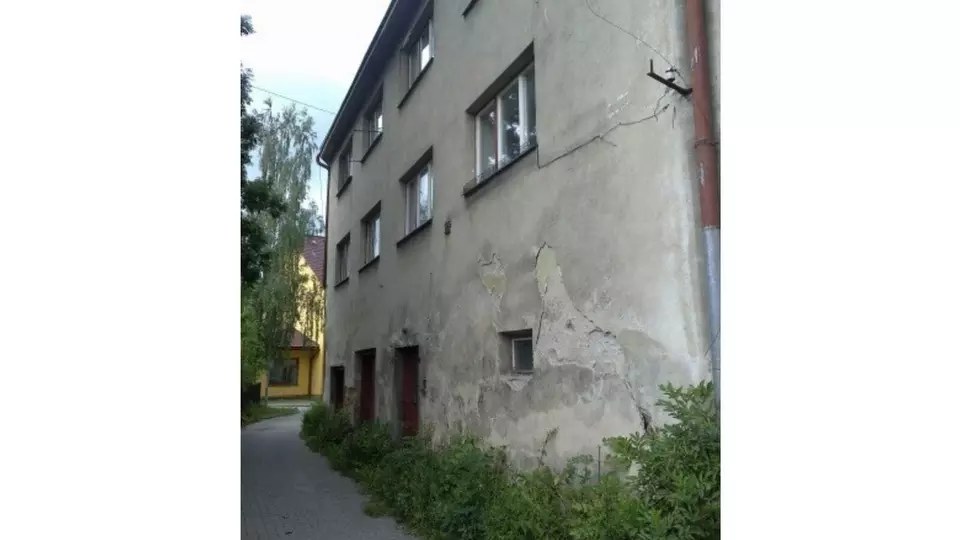 Zateplená fasáda domu před rekonstrukcí