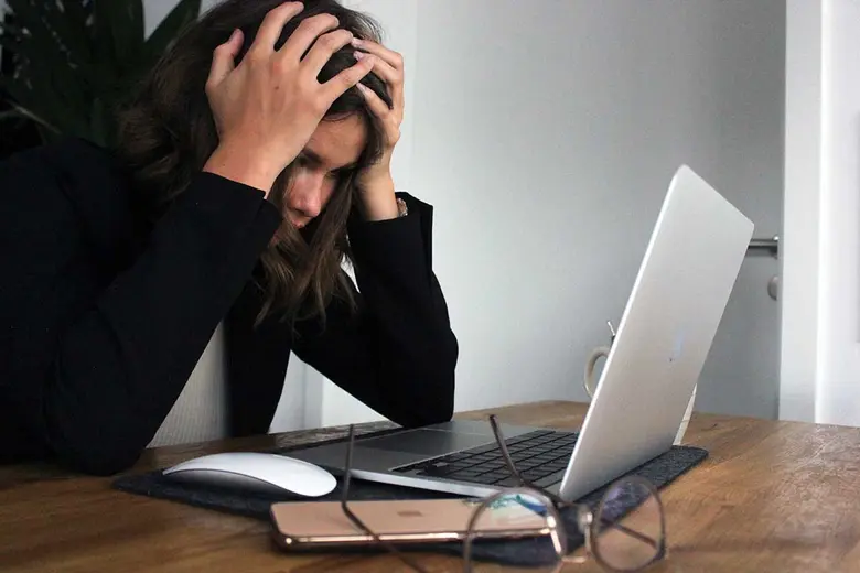Stressed woman at desk